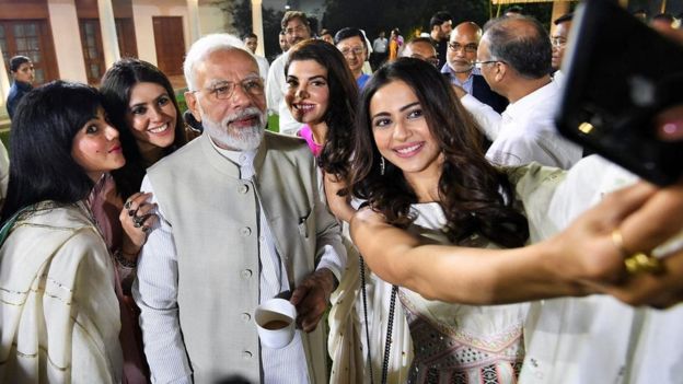 What are so many film stars doing to PM Modi?