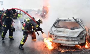 France stalled by nationwide strike, violent clashes in many places